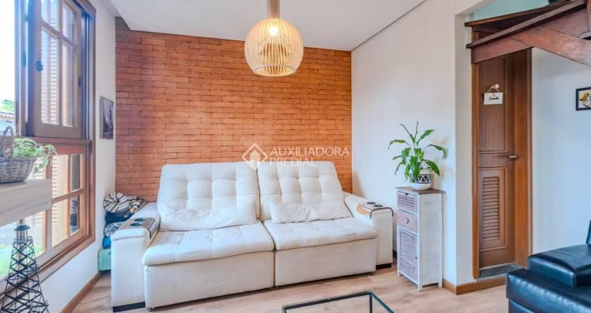 Casa em condomínio fechado com 3 quartos à venda na Avenida Jacuí, 774, Cristal, Porto Alegre