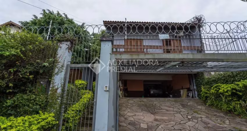 Casa em condomínio fechado com 4 quartos à venda na Rua Gilberto Laste, 37, Santa Tereza, Porto Alegre