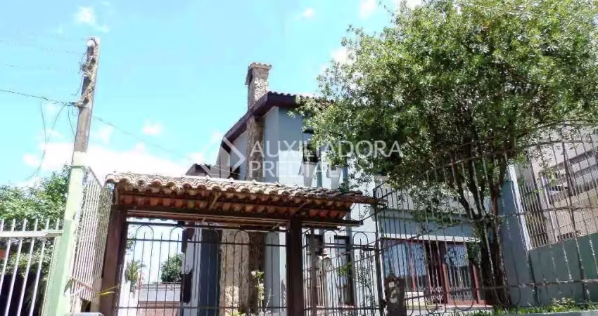 Casa em condomínio fechado com 5 quartos à venda na Rua Carajá, 213, Vila Assunção, Porto Alegre