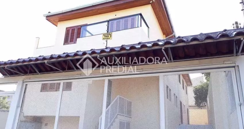 Casa em condomínio fechado com 3 quartos à venda na Rua Humberto de Campos, 1135, Partenon, Porto Alegre