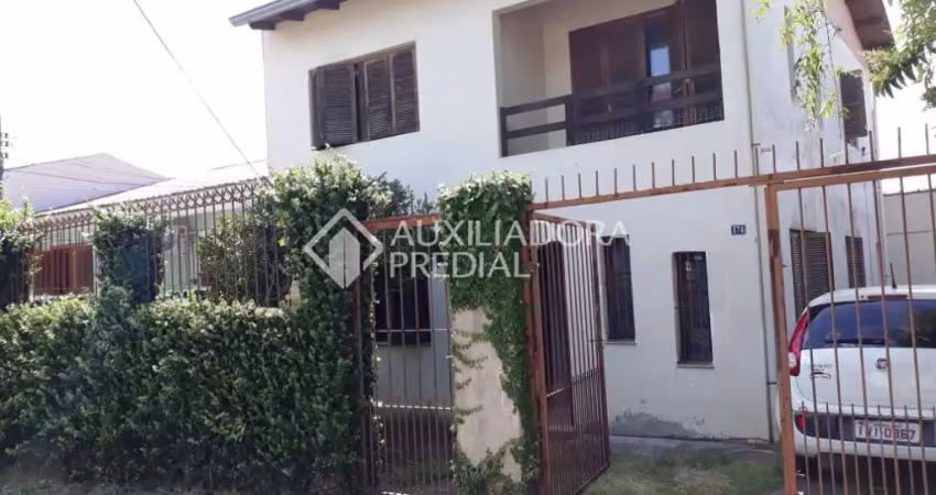 Casa em condomínio fechado com 4 quartos à venda na Rua Doze de Outubro, 674, Partenon, Porto Alegre