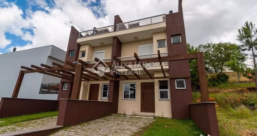 Casa em condomínio fechado com 3 quartos à venda na Rua Senador Mondin, 36, Hípica, Porto Alegre