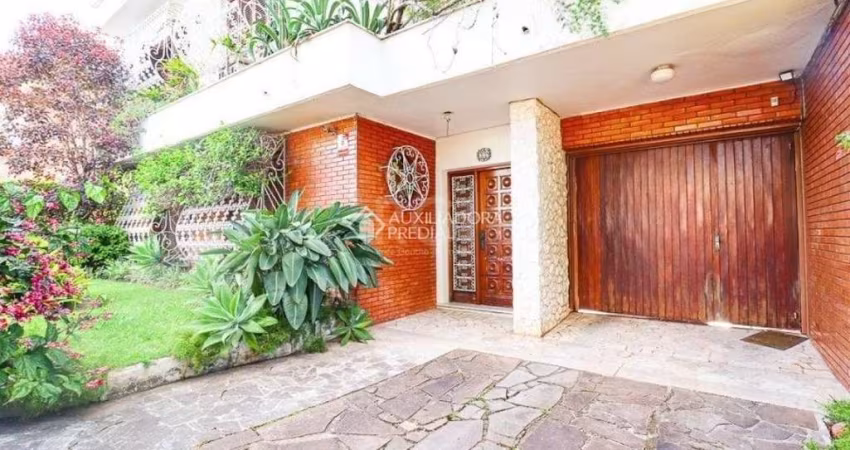 Casa com 5 quartos à venda na Rua Campos Elíseos, 225, Glória, Porto Alegre