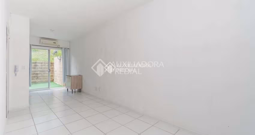 Casa em condomínio fechado com 2 quartos à venda na Estrada Caminho do Meio, 5701, Stella Maris, Alvorada