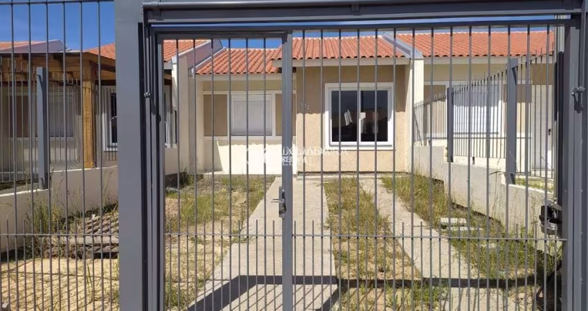 Casa em condomínio fechado com 2 quartos à venda na Rua Sete Mil e Quatorze, 102, Restinga, Porto Alegre