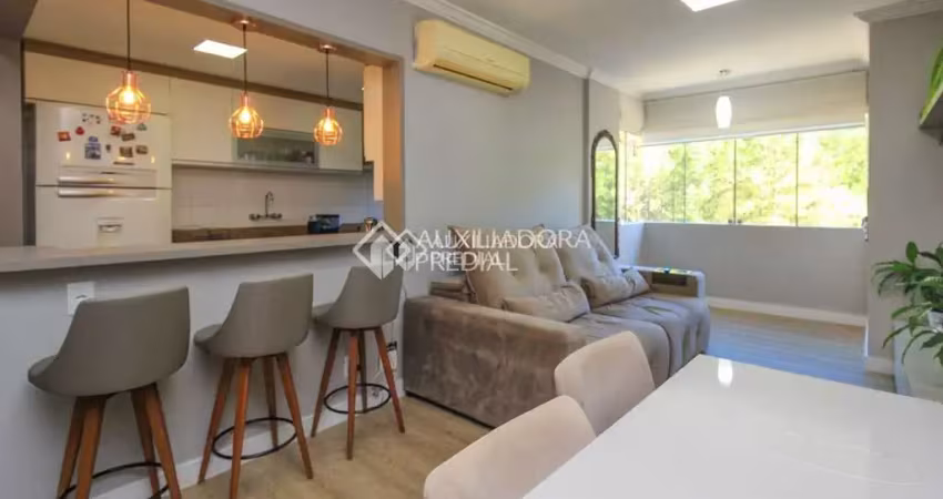 Apartamento com 3 quartos à venda na Rua Costa Lima, 790, Nonoai, Porto Alegre