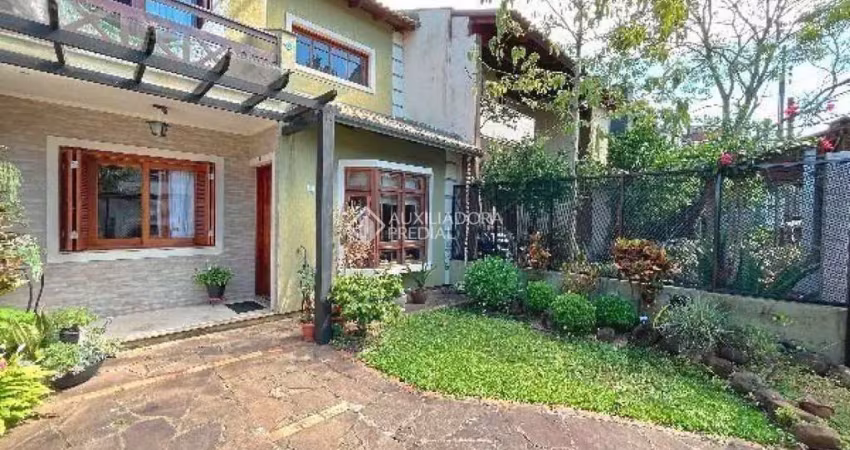 Casa com 3 quartos à venda na Rua Irany de Oliveira Sant'Anna, 41, Hípica, Porto Alegre