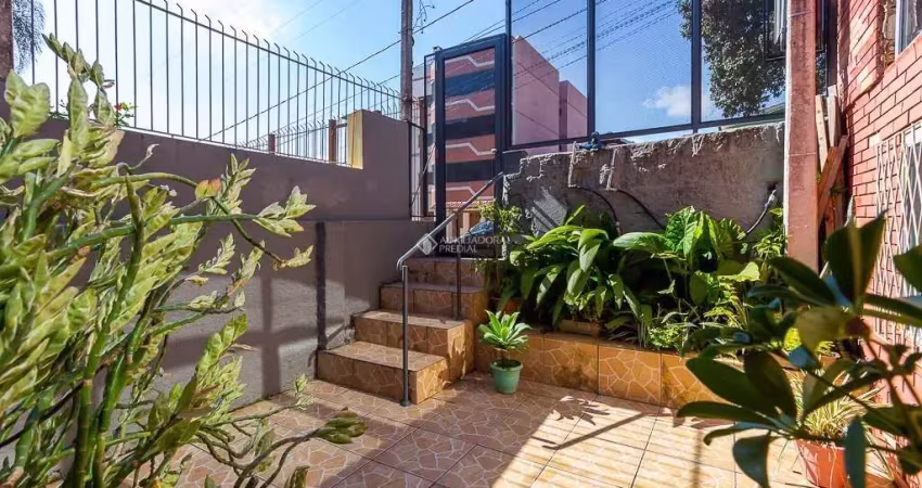 Casa com 3 quartos à venda na Rua Batista Xavier, 289, Partenon, Porto Alegre