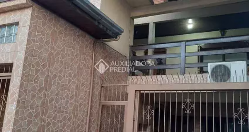 Casa com 3 quartos à venda na Tarumã, 47, Sarandi, Porto Alegre