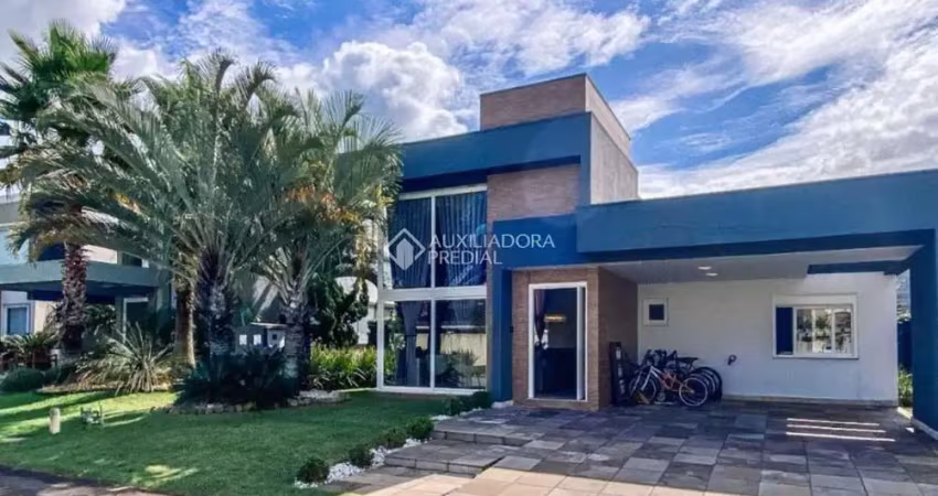 Casa em condomínio fechado com 5 quartos à venda na Rua Rio Novo, 2672, Centro, Xangri-Lá