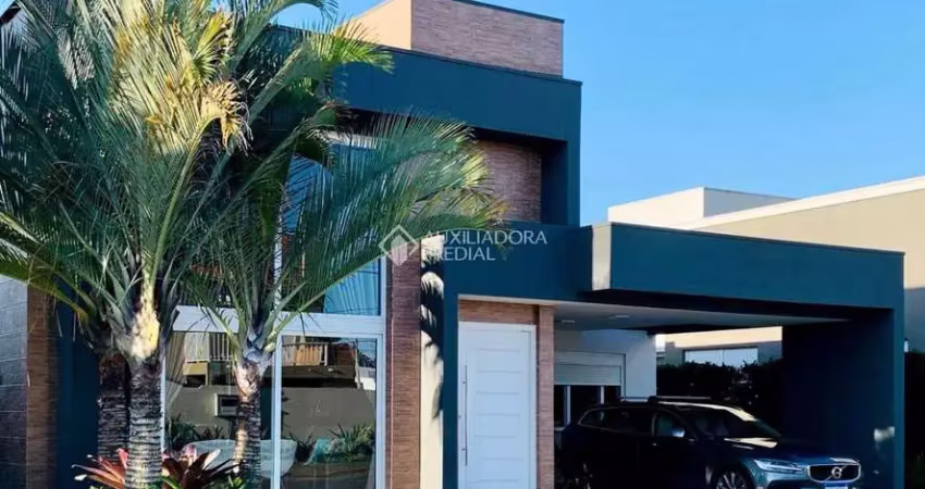 Casa em condomínio fechado com 5 quartos à venda na Rua Rio Novo, 2672, Centro, Xangri-Lá