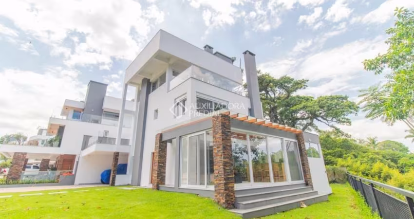 Casa em condomínio fechado com 3 quartos para alugar na Avenida Coronel Marcos, 1239, Pedra Redonda, Porto Alegre
