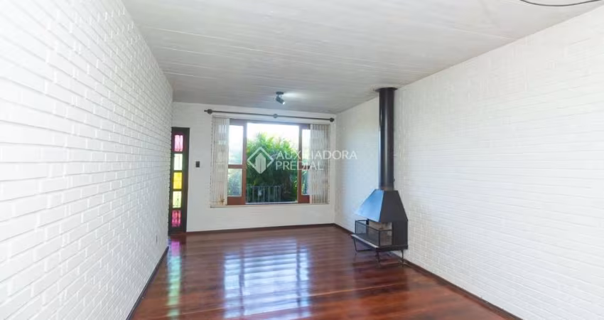 Casa em condomínio fechado com 4 quartos para alugar na Rua Rafael Clark, 407, Partenon, Porto Alegre