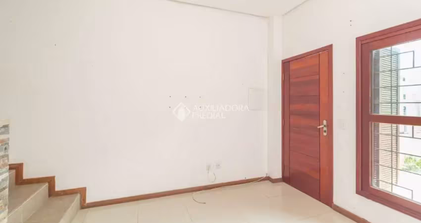 Casa em condomínio fechado com 2 quartos para alugar na Rua Manoel Nunes da Silva, 81, Guarujá, Porto Alegre