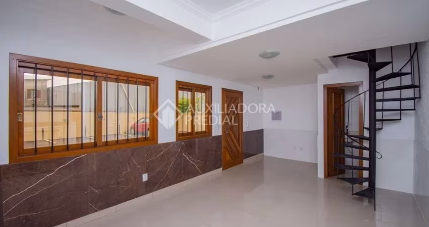 Casa em condomínio fechado com 3 quartos para alugar na Avenida Outeiro, 83, Coronel Aparício Borges, Porto Alegre