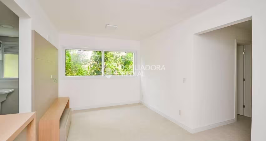 Apartamento com 3 quartos para alugar na Rua Joaquim Cruz, 300, Santo Antônio, Porto Alegre