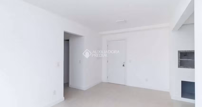Apartamento com 3 quartos para alugar na Rua Joaquim Cruz, 300, Santo Antônio, Porto Alegre