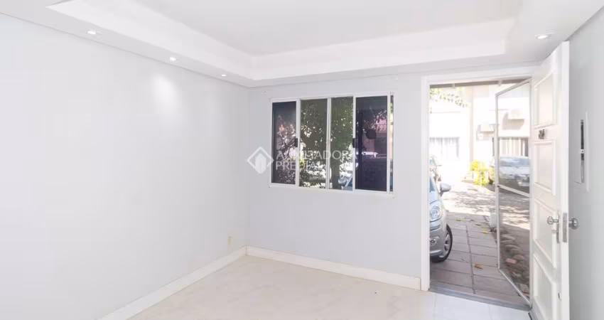 Casa em condomínio fechado com 3 quartos para alugar na Avenida José Aloísio Filho, 801, Humaitá, Porto Alegre
