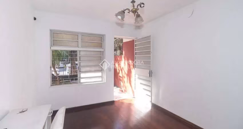 Casa em condomínio fechado com 3 quartos para alugar na Avenida Mariland, 1203, Auxiliadora, Porto Alegre