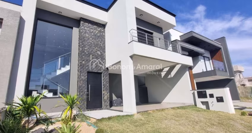 Casa em condomínio à venda, com 4 suítes (1 térrea), 198 m² de área construída