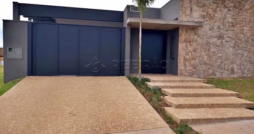 Casa térrea diferenciada em condomínio fechado, 3 suítes com armários e ar-condicionado, sala 3 ambientes, lavabo, espaço gourmet e cozinha integradas.