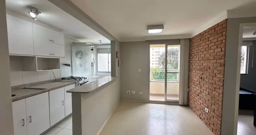Apartamento semi-mobiliado com 2 quartos 1 suíte e 1 vaga no portão