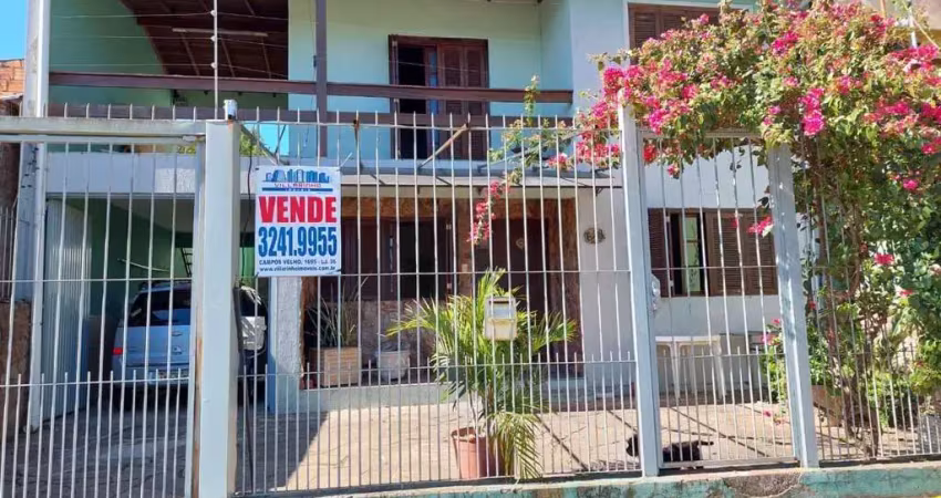 Casa com 6 quartos à venda na Avenida Paulo Pontes, 648, Cavalhada, Porto Alegre