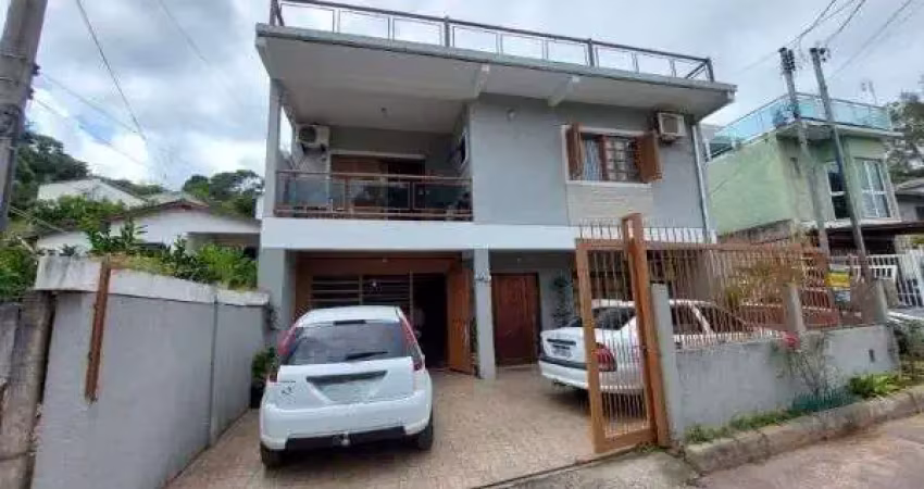 Casa com 4 quartos à venda na Estrada Aracaju, 1145, Vila Nova, Porto Alegre