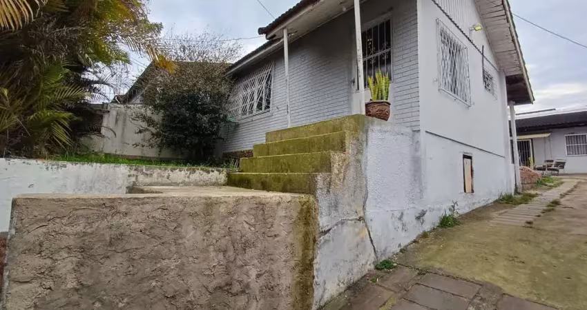 Atençao junto ao zaffari cavalhada terreno com 2 casas  de alvenaria