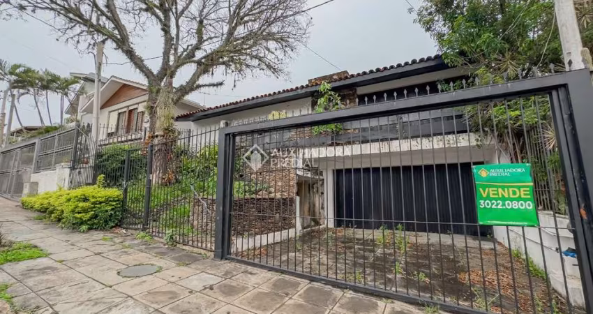 Casa com 4 quartos à venda na Rua Professor Fernando Carneiro, 102, Três Figueiras, Porto Alegre