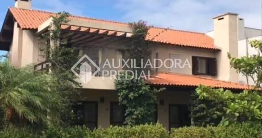 Casa em condomínio fechado com 4 quartos à venda na Avenida Homero Ribeiro, 1, Remanso, Xangri-Lá