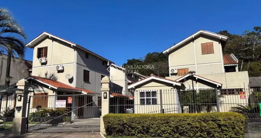 Casa em condomínio fechado com 3 quartos à venda na Rua Professor Carvalho de Freitas, 1485, Cascata, Porto Alegre