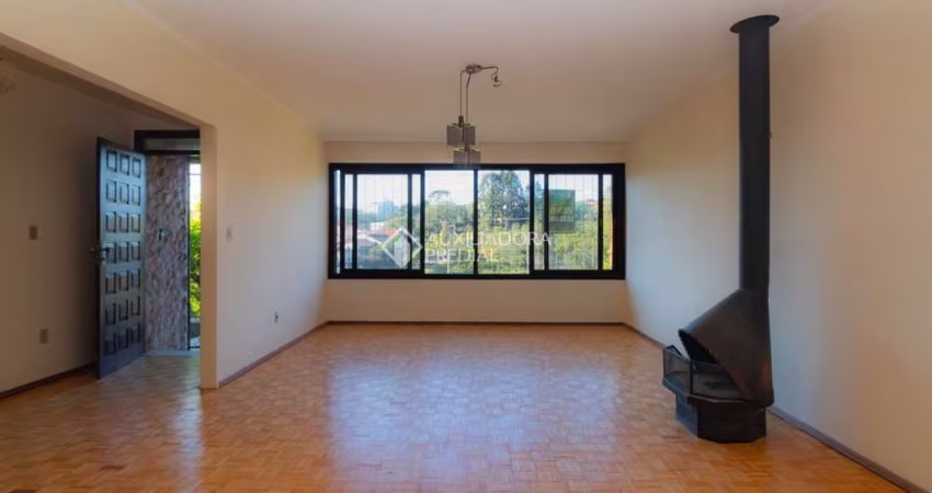 Casa em condomínio fechado com 3 quartos à venda na Rua Felipe Becker, 419, Três Figueiras, Porto Alegre