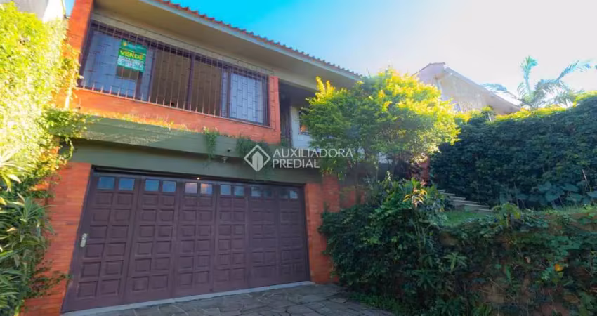 Casa em condomínio fechado com 3 quartos à venda na Rua Felipe Becker, 419, Três Figueiras, Porto Alegre