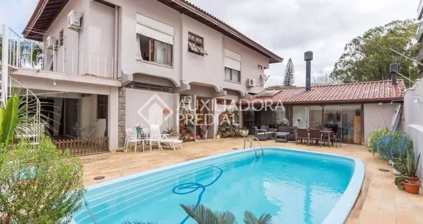 Casa em condomínio fechado com 3 quartos à venda na Avenida Montreal, 356, Jardim Lindóia, Porto Alegre