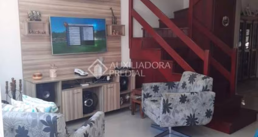 Casa em condomínio fechado com 3 quartos à venda na Avenida da Cavalhada, 5075, Cavalhada, Porto Alegre