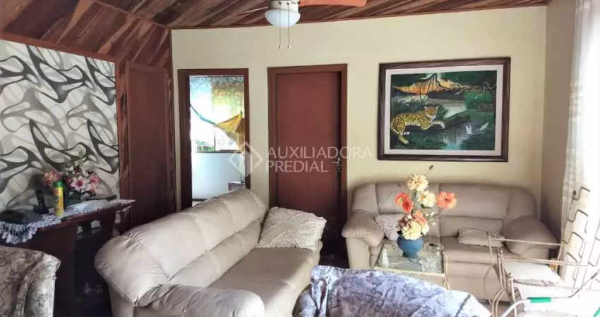 Casa em condomínio fechado com 4 quartos à venda na Rua General Salvador Pinheiro, 258, Vila Jardim, Porto Alegre