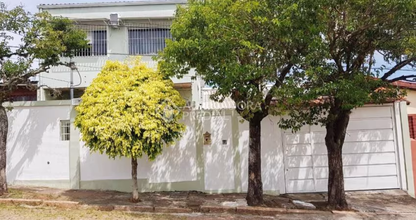 Casa em condomínio fechado com 4 quartos à venda na Rua Querubim Costa, 187, Coronel Aparício Borges, Porto Alegre