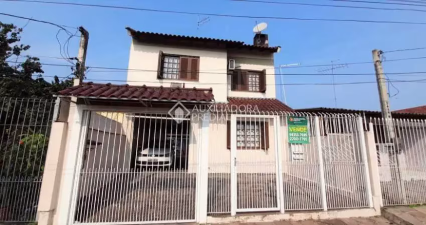 Casa com 3 quartos à venda na Rua Integração, 348, Jardim Algarve, Alvorada