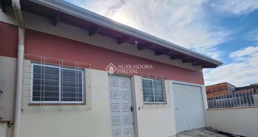 Casa com 3 quartos à venda na Quarenta e Três, 53, Jardim Algarve, Alvorada
