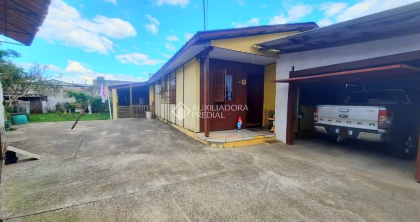 Casa com 3 quartos à venda na Pompílio dos Reis, 6, Jardim Algarve, Alvorada