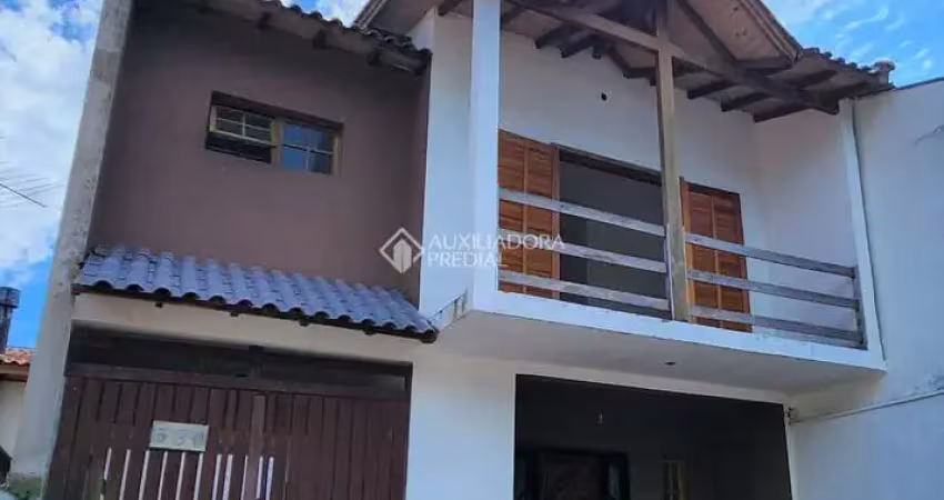 Casa com 3 quartos à venda na Avenida Zero Hora, 580, Jardim Algarve, Alvorada