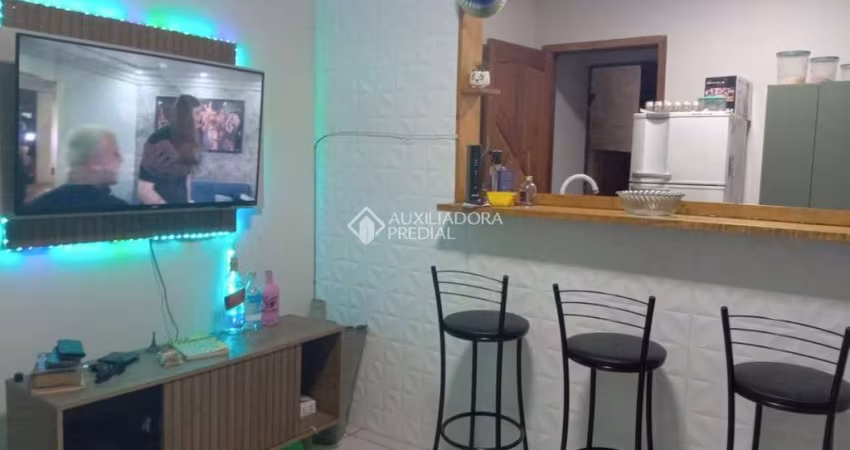 Casa com 1 quarto à venda na Rua Curiós, 387, Jardim Algarve, Alvorada