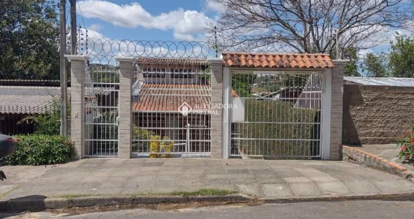 Casa com 4 quartos à venda na Rua Banco do Comércio, 32, Santa Tereza, Porto Alegre