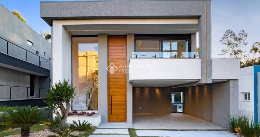 Casa em condomínio fechado com 3 quartos à venda na Avenida Senador Salgado Filho, 8500, Querência, Viamão