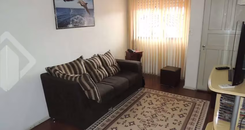 Casa em condomínio fechado com 3 quartos à venda na Rua Gildo de Freitas, 56, Jardim Algarve, Alvorada