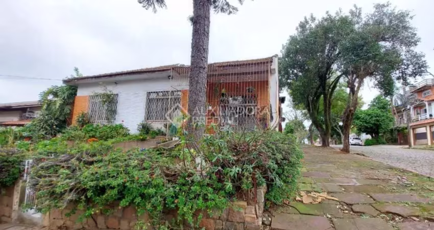 Casa com 3 quartos à venda na Rua Batista Xavier, 116, Partenon, Porto Alegre