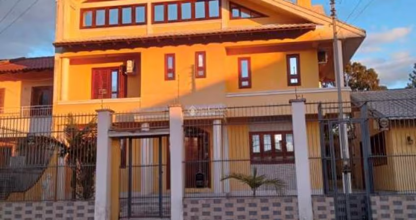 Casa com 4 quartos à venda na Avenida Vasco Alves Pereira, 6, Morada da Colina, Guaíba