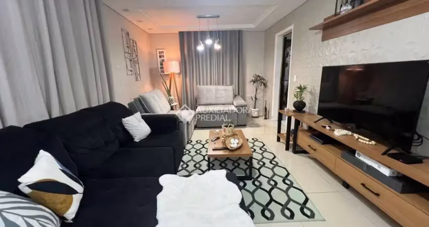 Casa em condomínio fechado com 3 quartos à venda na Sessenta E Dois (Cj Hab R C Gonçalves), 153, Jardim Santa Rita, Guaíba