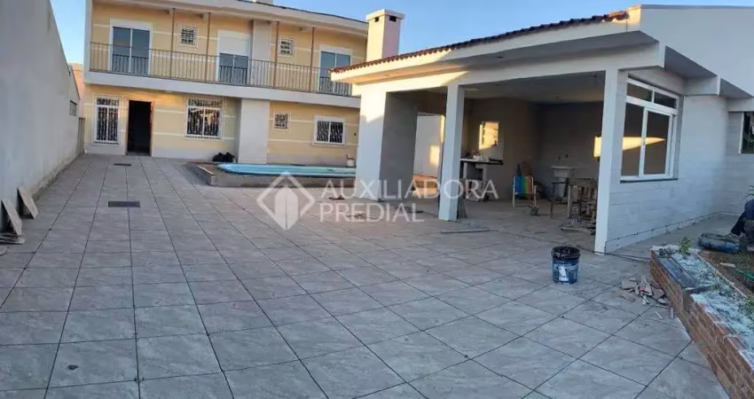 Casa em condomínio fechado com 4 quartos à venda na Rua Província de São Pedro, 100, Jardim dos Lagos, Guaíba
